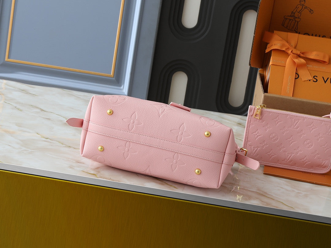 Louis Vuitton pink carry all bag
