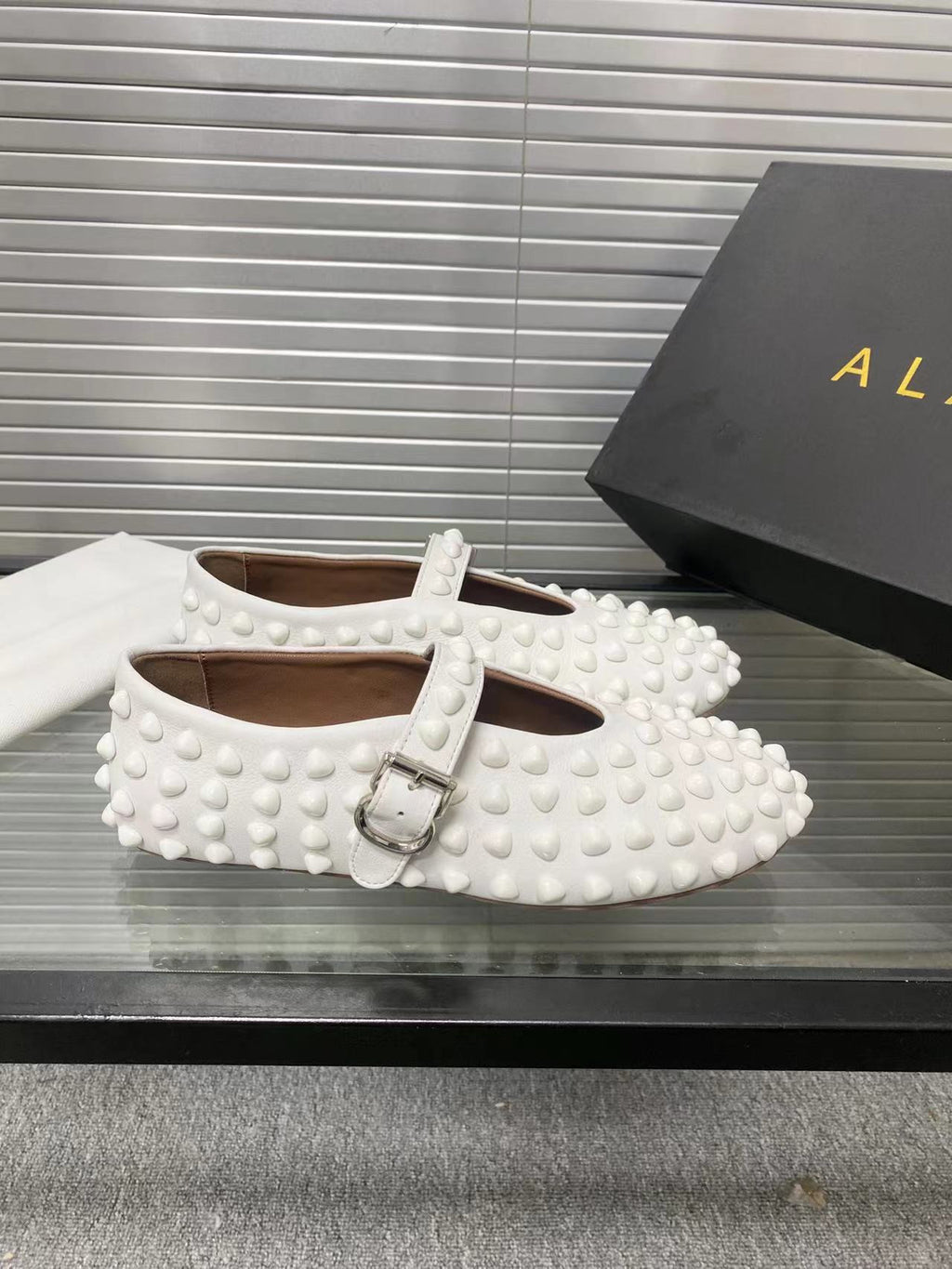 Alaia ballet flats white