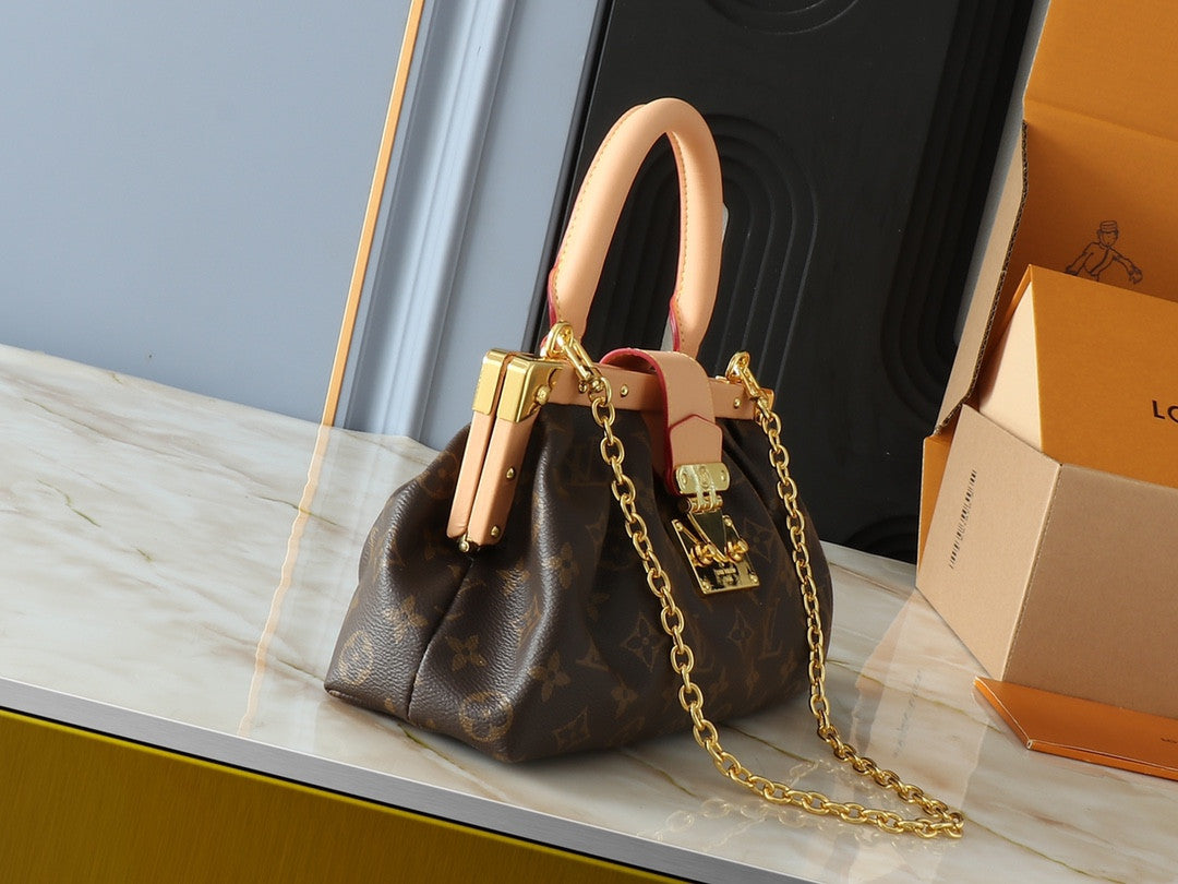 LV Monogram Clutch