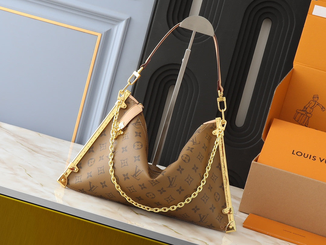 Louis Vuitton carryng leather bag