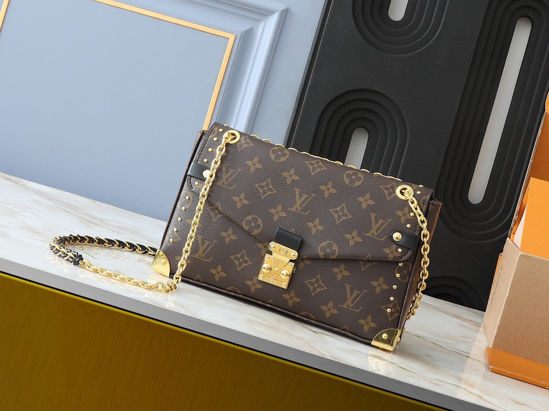 Louis Vuitton trunkie bag