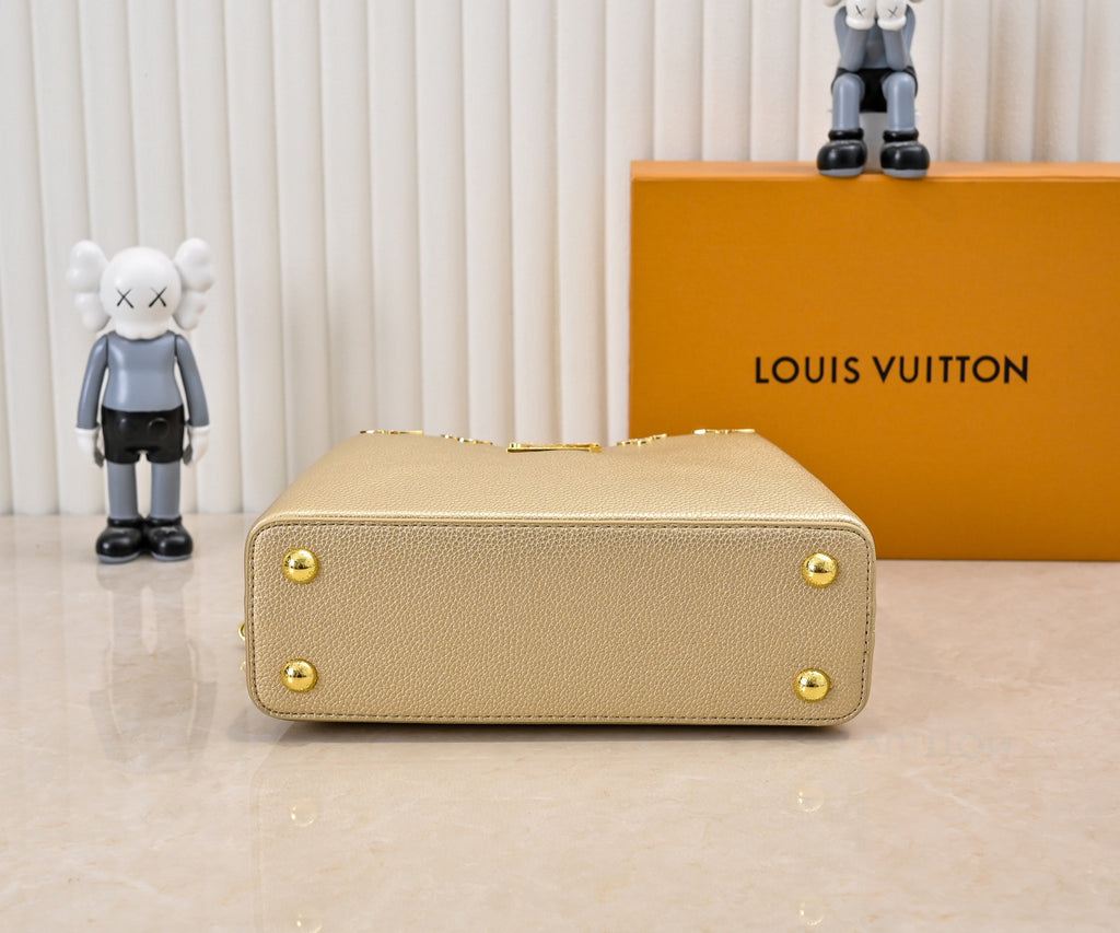 Louis Vuitton Capucines in gold