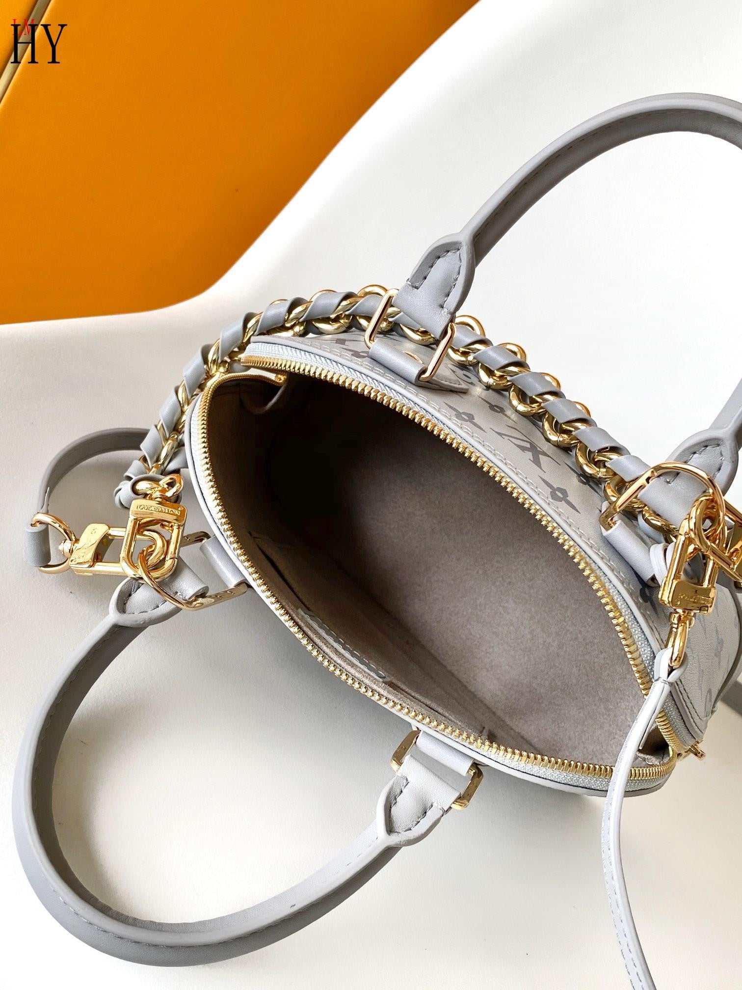 Louis Vuitton grey bag