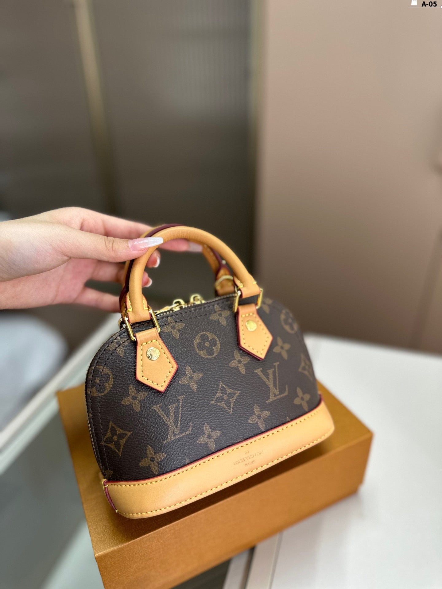 LV Alma Nano Bag
