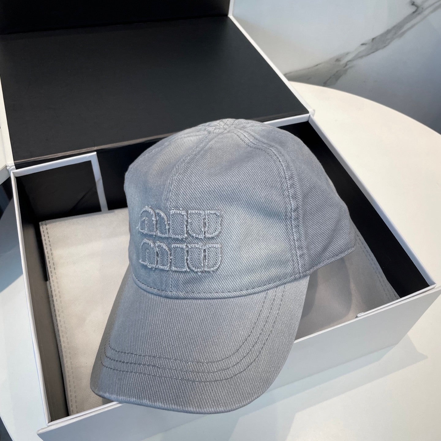 Miu Miu cap grey