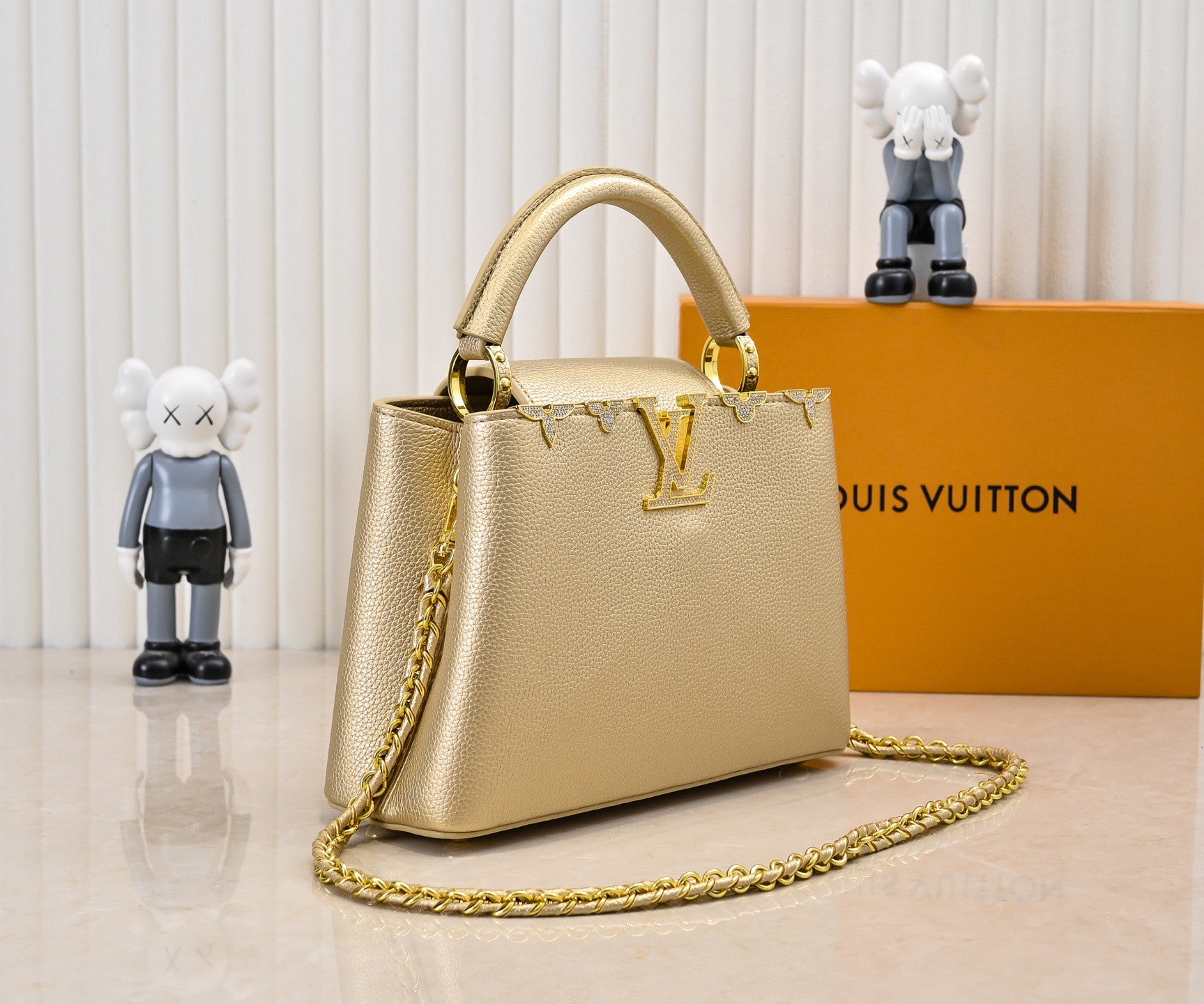 Louis Vuitton Capucines in gold