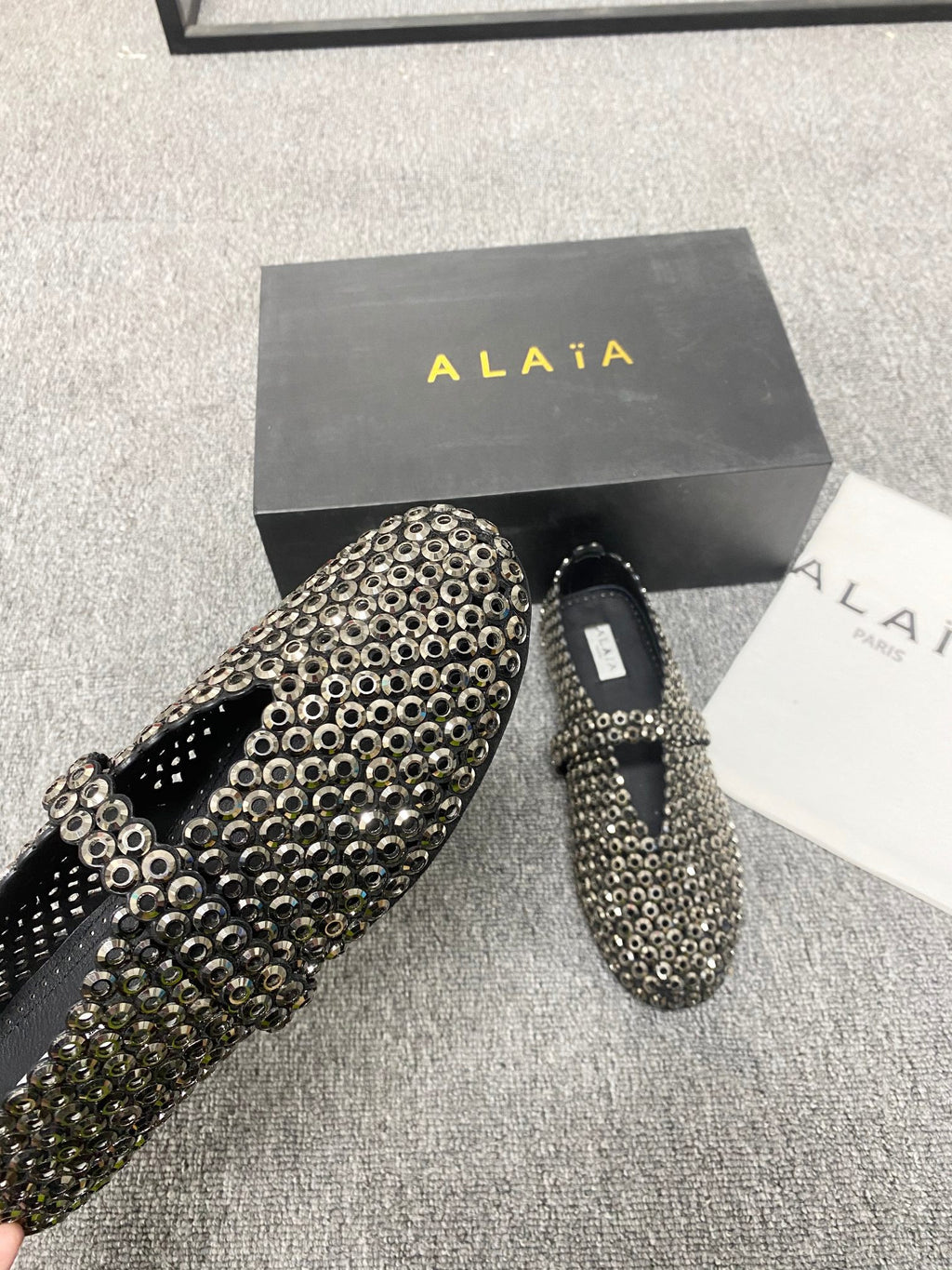 Alaia ballet flats in glass