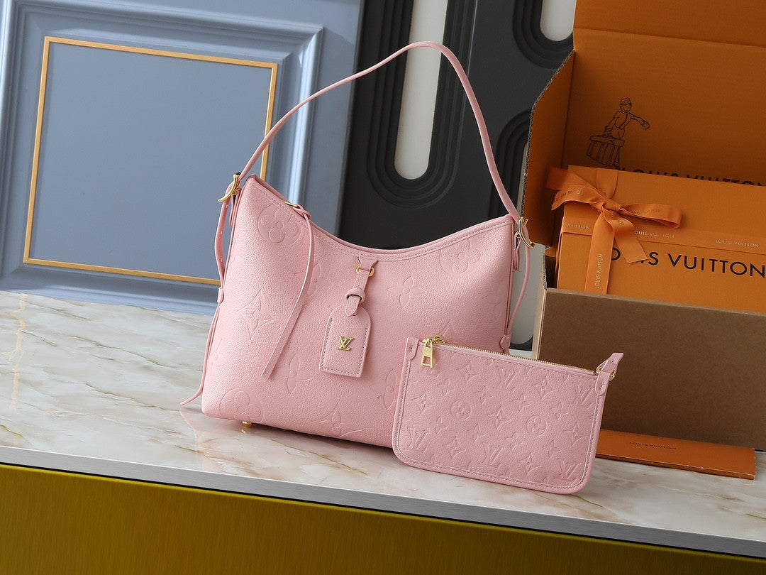 Louis Vuitton pink carry all bag