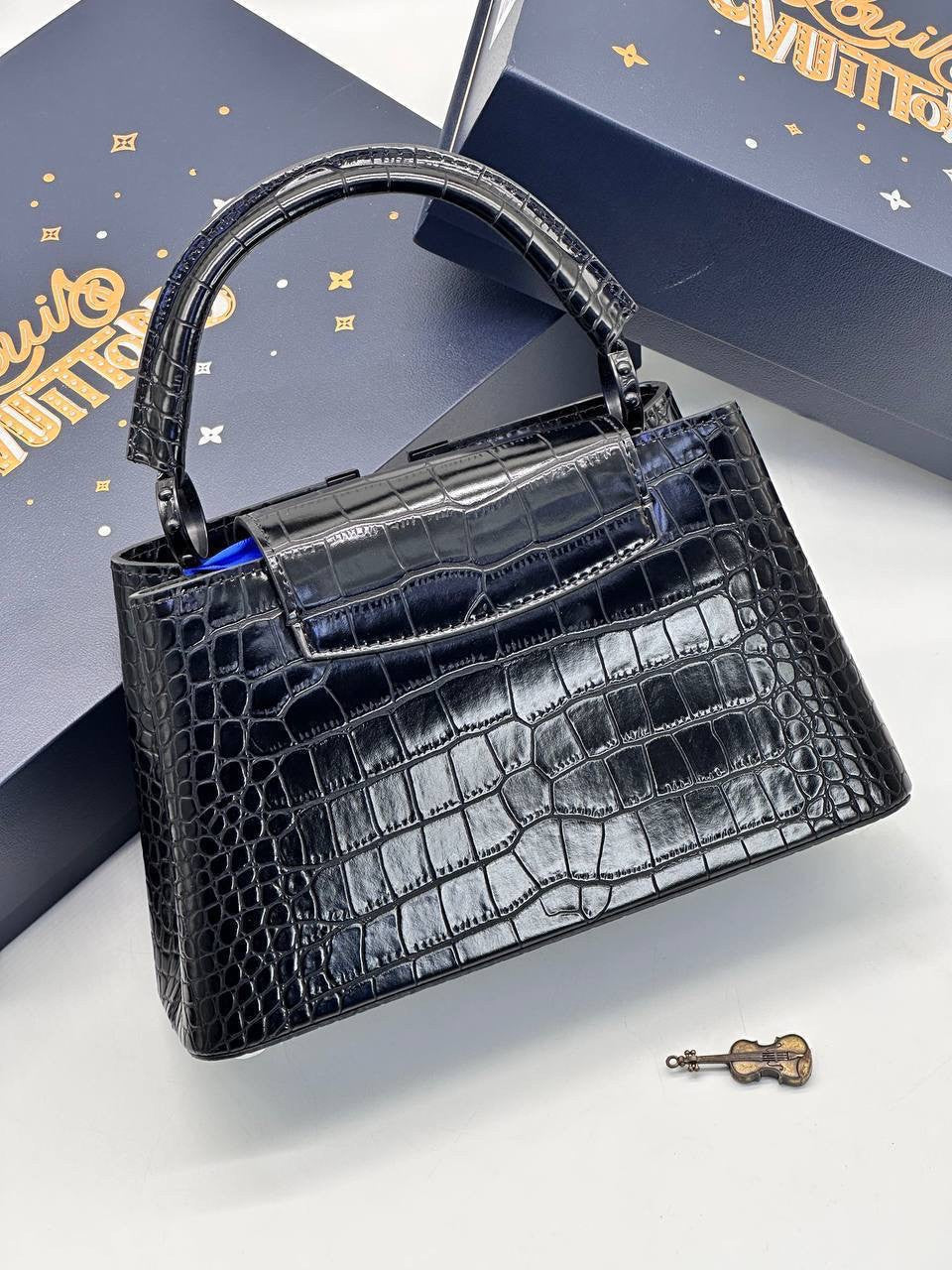 Louis Vuitton Capucines black leather crossbody bag