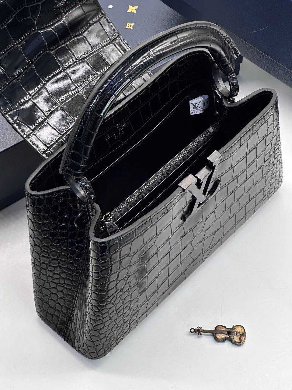 Louis Vuitton Capucines black leather crossbody bag