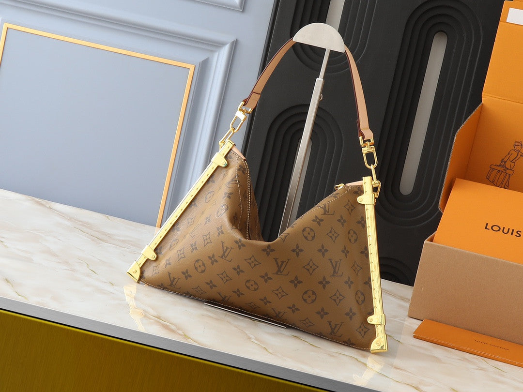 Louis Vuitton carryng leather bag
