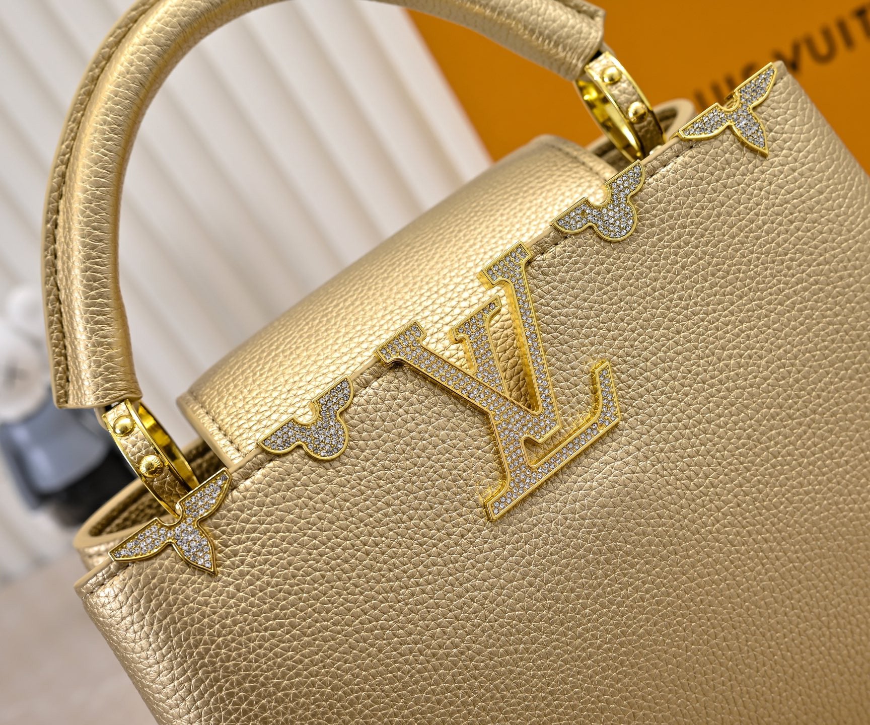 Louis Vuitton Capucines in gold