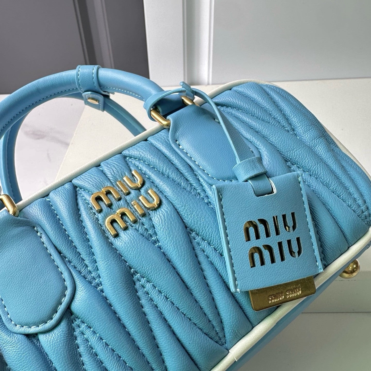 Miu Miu blue bag