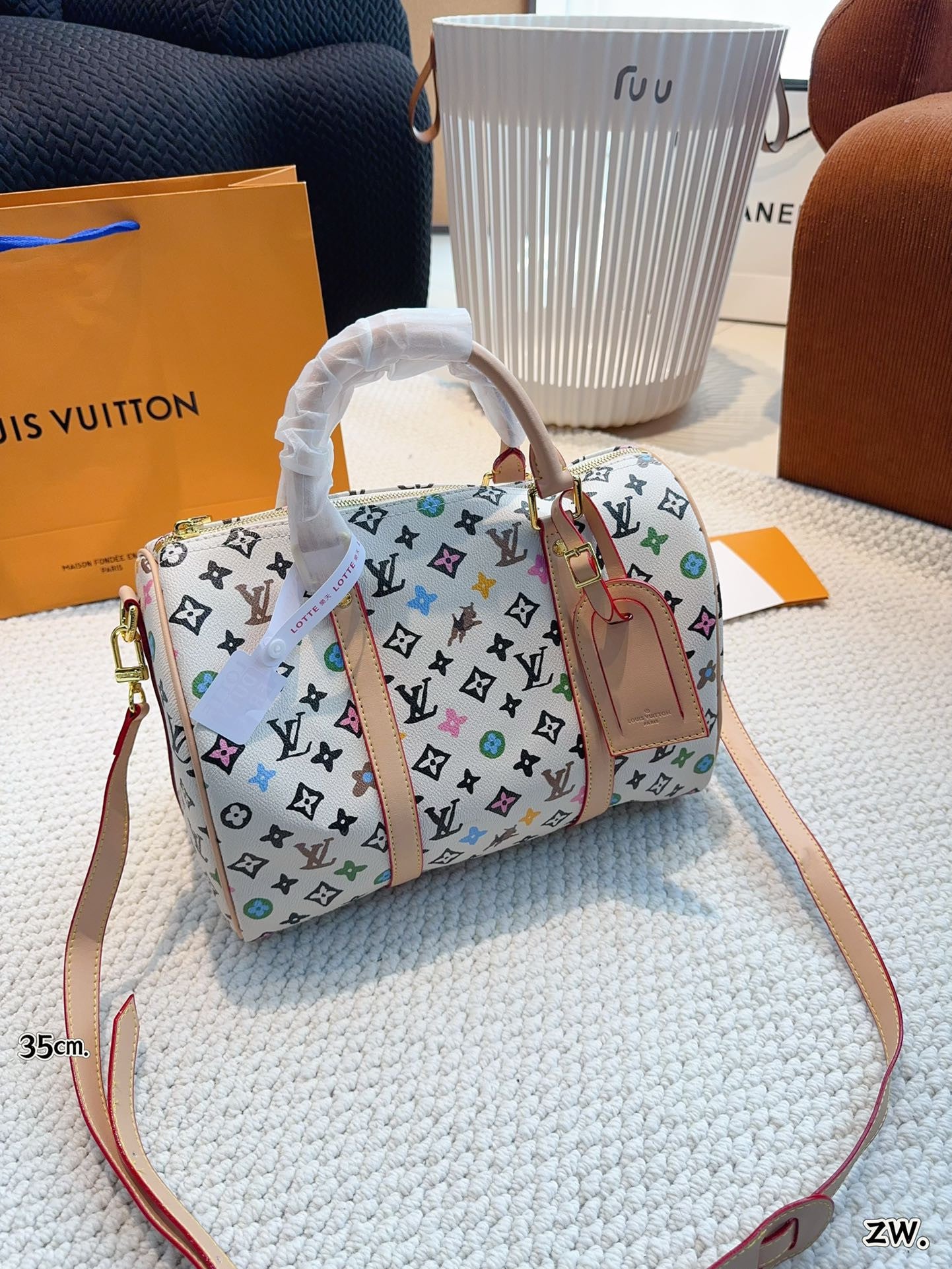 LV Keepall Bandoulière