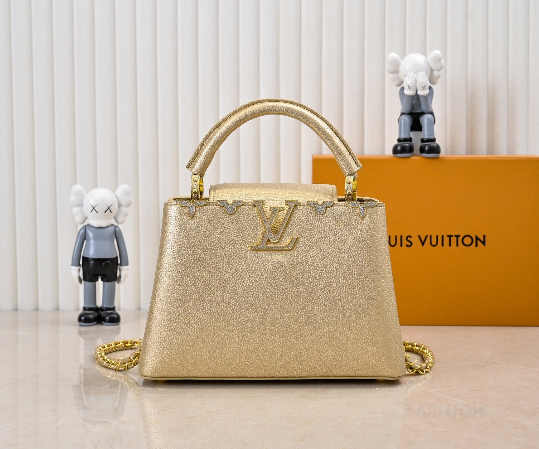 Louis Vuitton Capucines in gold