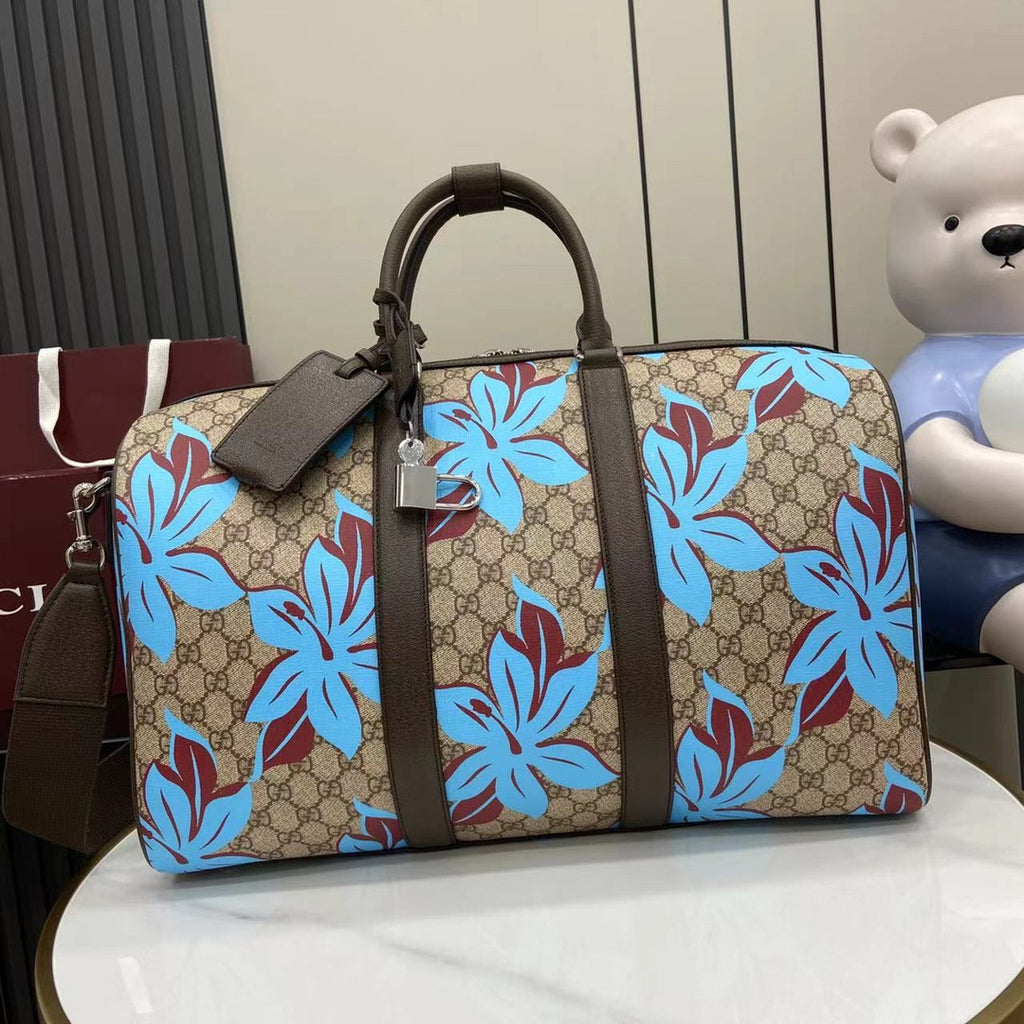 Gucci supreme gg travel bag