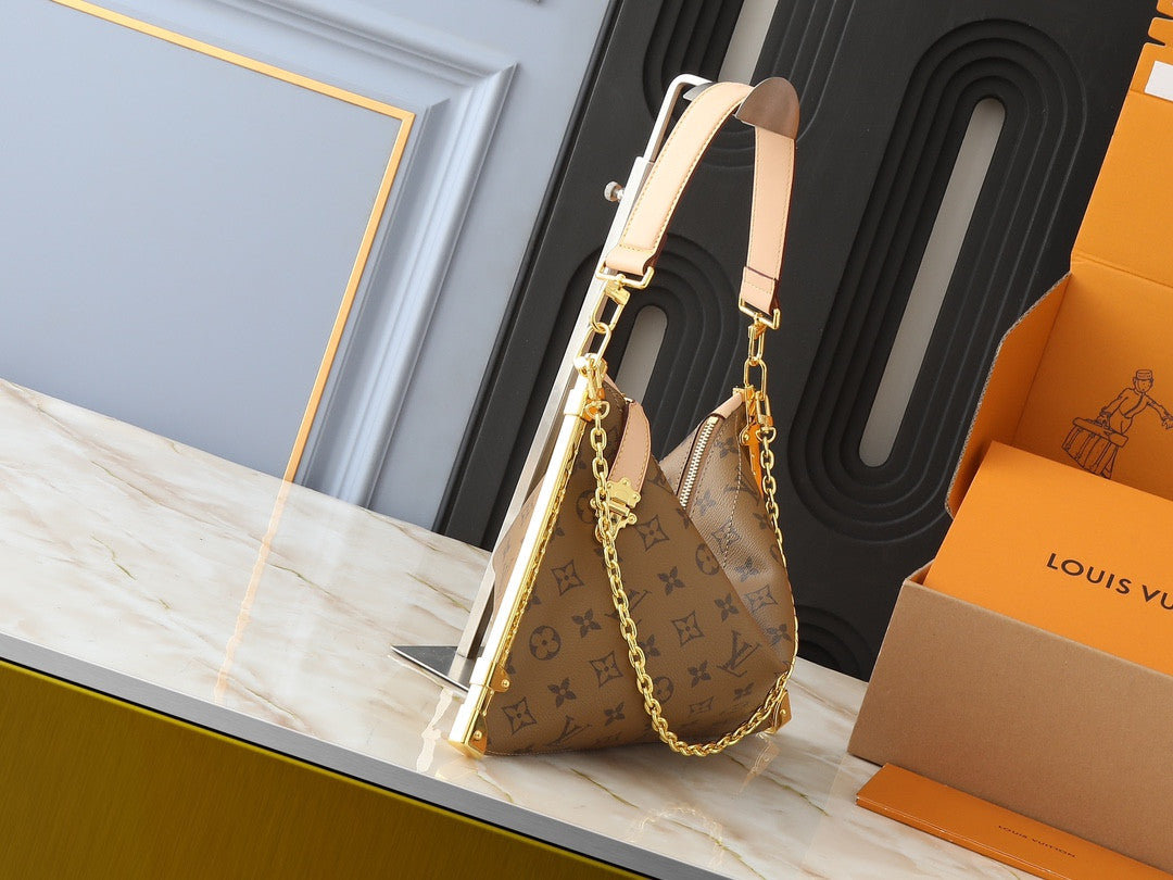 Louis Vuitton carryng leather bag