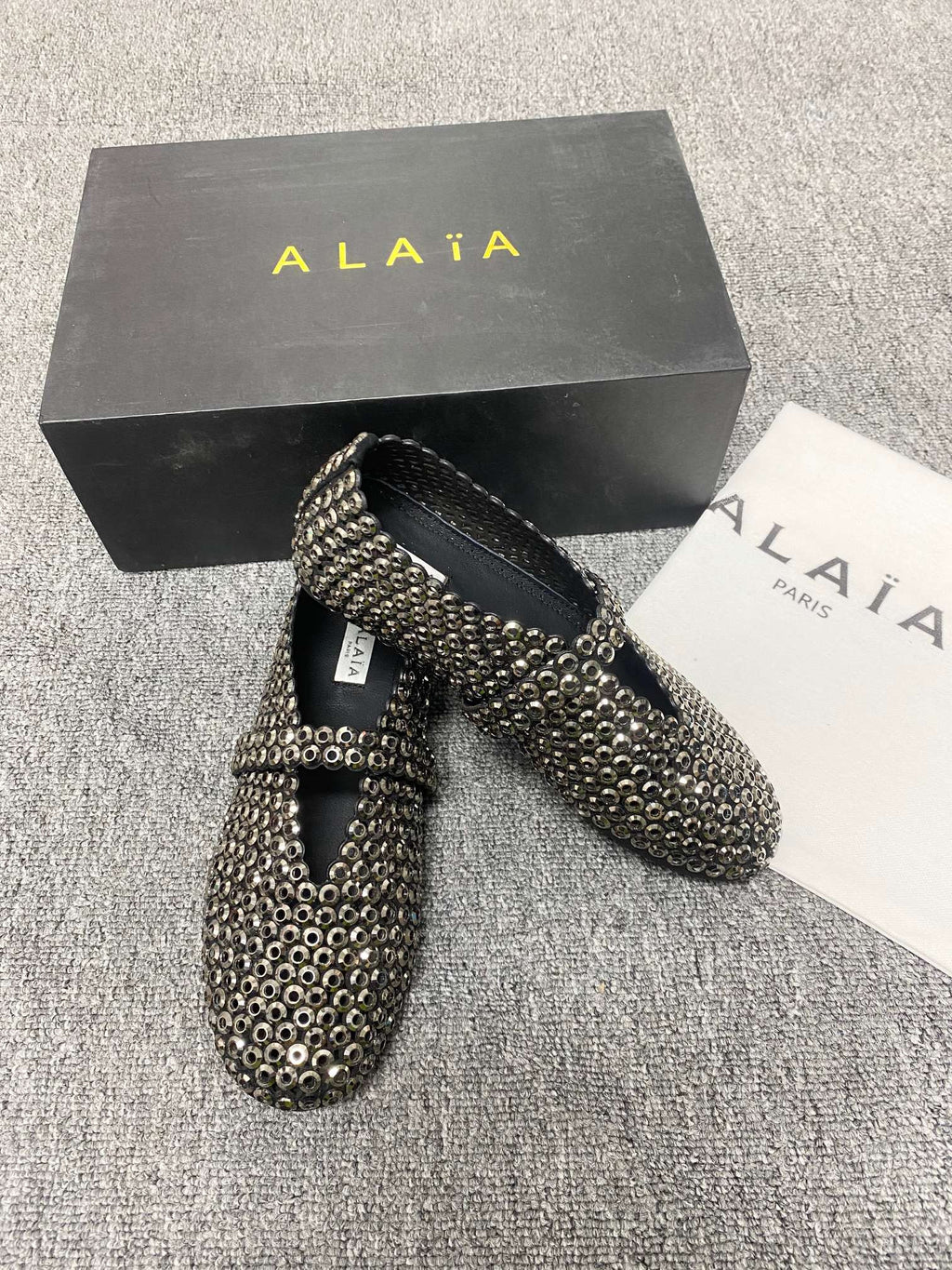 Alaia ballet flats in glass