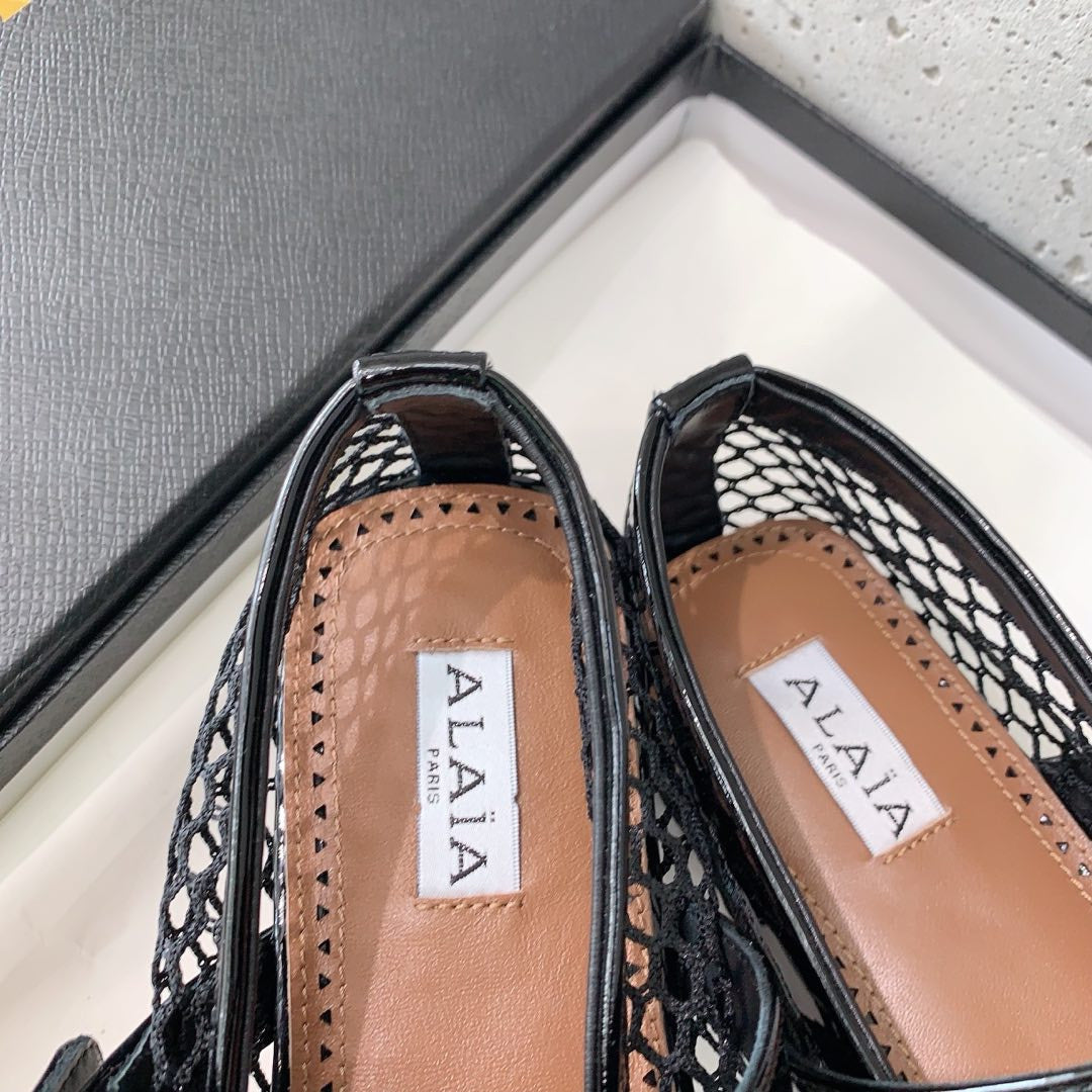 Alaia fishnet ballet flats