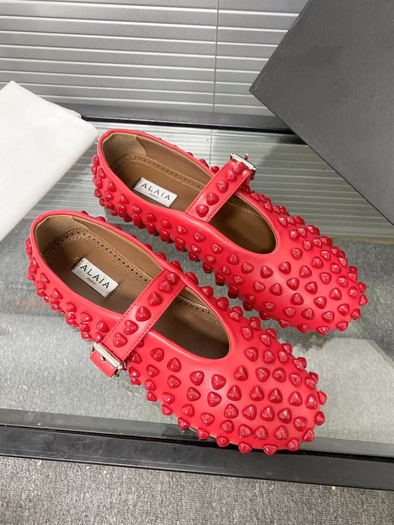 Alaia ballet flats red